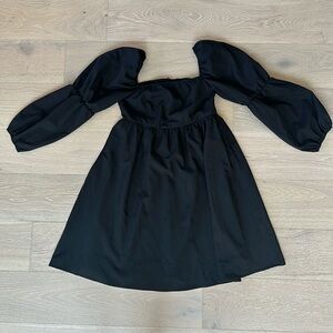 Black mini dress with puff sleeves